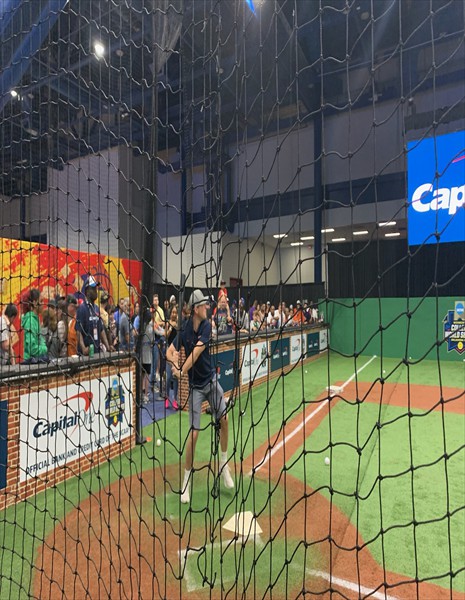 6_ Fan Fest Logan swinging for a home run